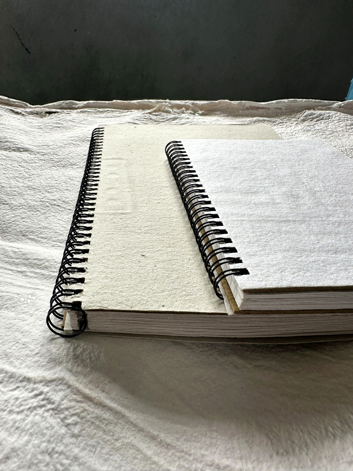 Freshly pressed sheets stacked at the press